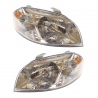 Juego de 2 Faros Principales con Fondo Cromado Auto Magic para Aveo, Pontiac G3
